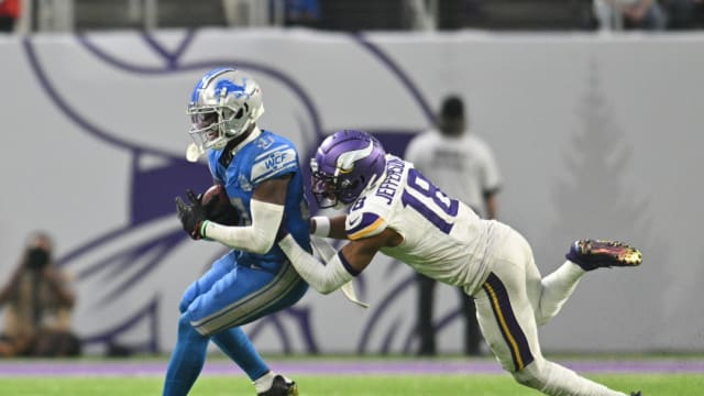 Detroit Lions safety Kerby Joseph runs with the ball after intercepting a pass in Detroit's win over the Minnesota Vikings.